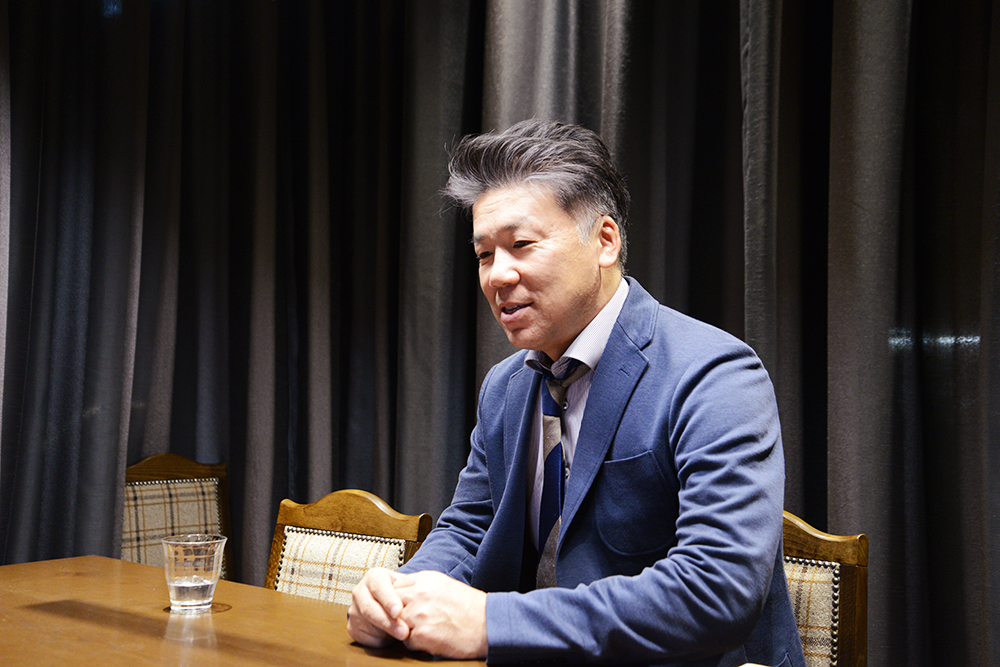株式会社タケノの濱田稔男様が、noncore導入による給与業務の効率化と社内キャリア活性化の成果について語る様子。